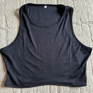 Perfect high neck black ribbed cropped tank every closet needs! Med/large